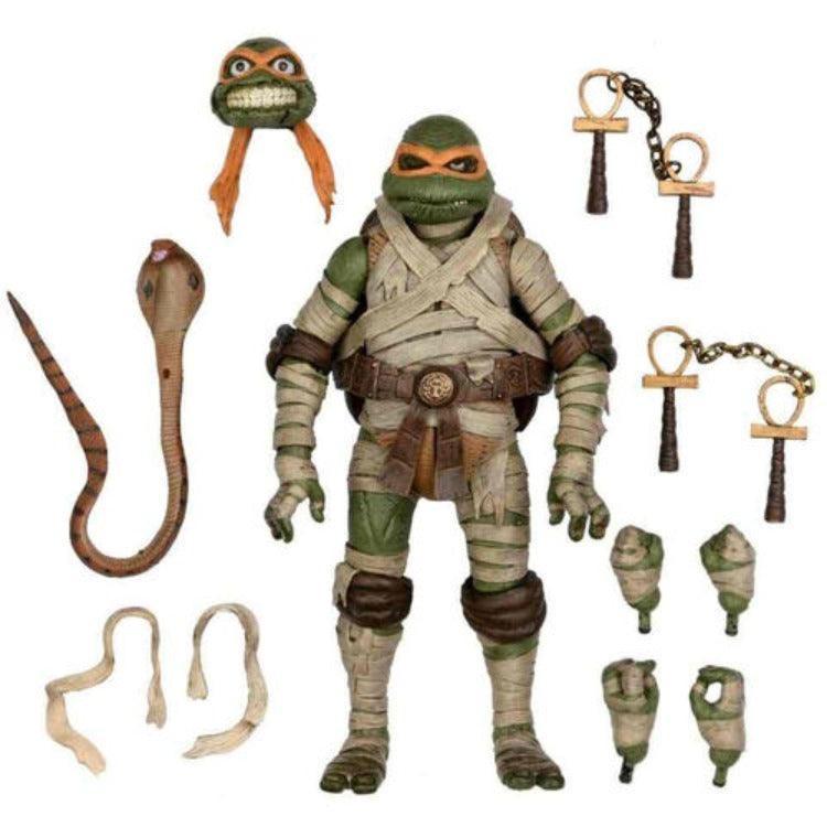 http://www.gingatoys.com/cdn/shop/files/universal-monsters-x-teenage-mutant-ninja-turtles-ultimate-michelangelo-as-the-mummy-figure-1.jpg?v=1693697569